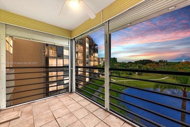 view of balcony at dusk