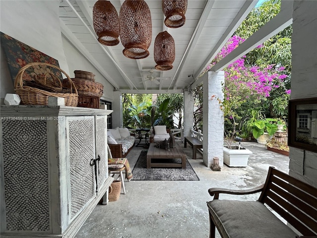 view of patio / terrace featuring ceiling fan and an outdoor living space