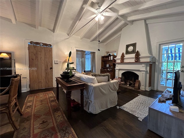 living room with high vaulted ceiling, a large fireplace, ceiling fan, dark wood-type flooring, and beam ceiling