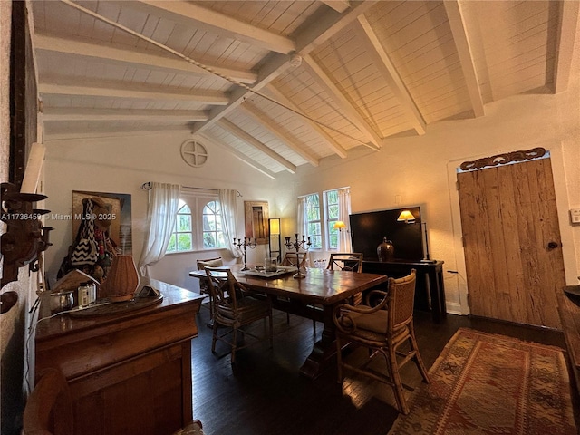 dining room with beamed ceiling, a healthy amount of sunlight, and dark wood-type flooring