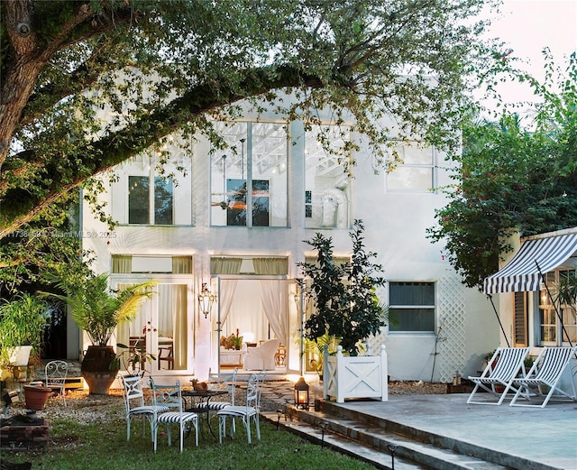 back of house featuring a patio