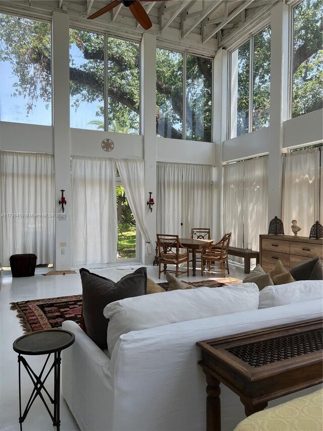 sunroom / solarium with ceiling fan