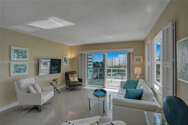 living room featuring a textured ceiling