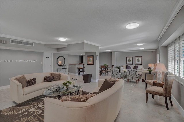 living room with crown molding and a textured ceiling