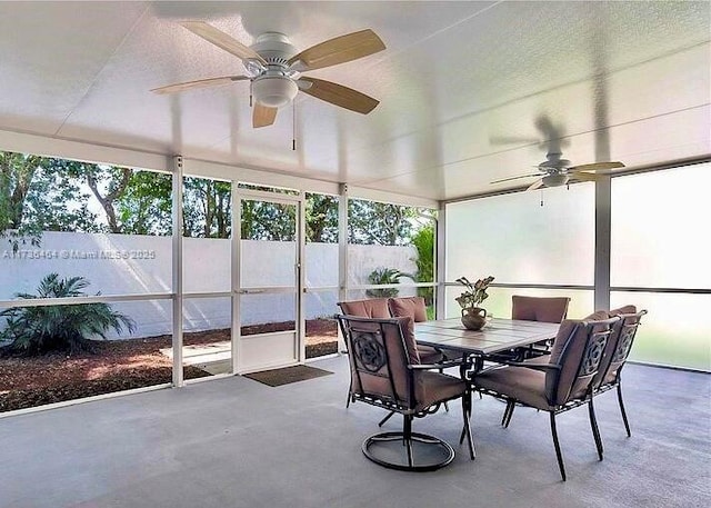 sunroom / solarium with ceiling fan