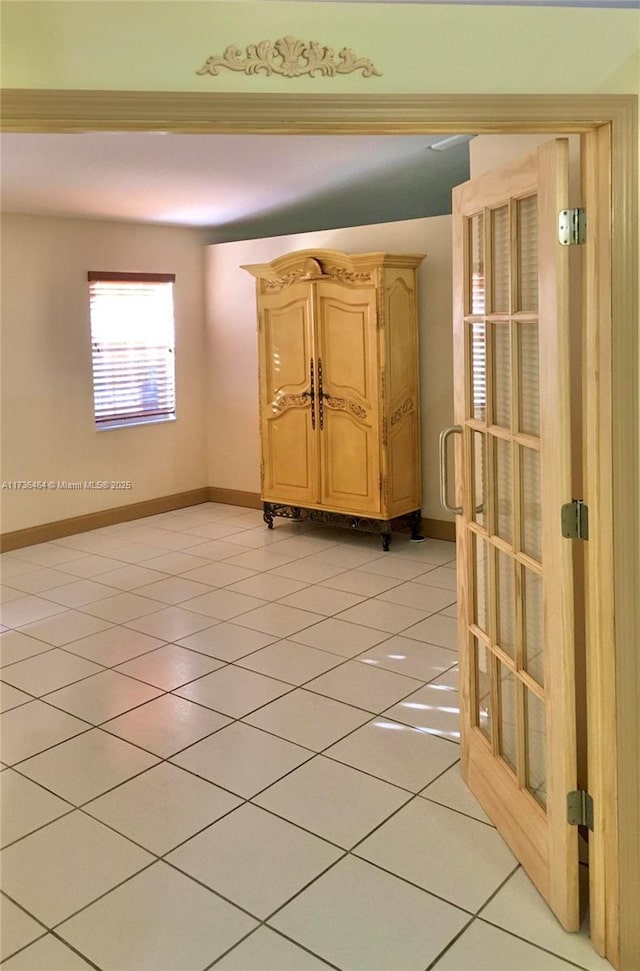 view of tiled spare room