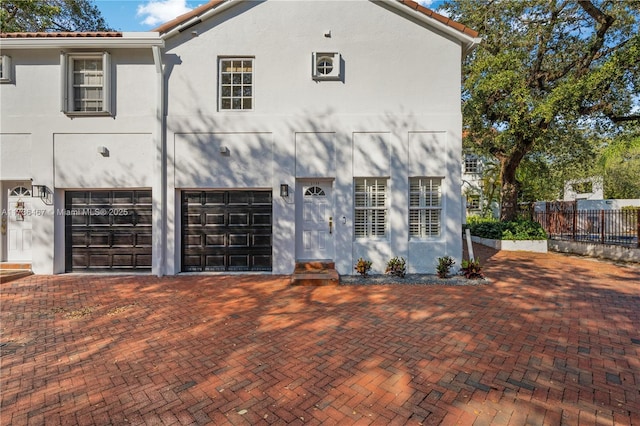 view of front of property featuring a garage