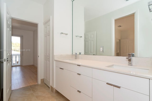 bathroom with vanity and tile patterned floors