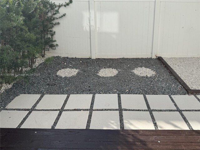 view of yard with a wooden deck