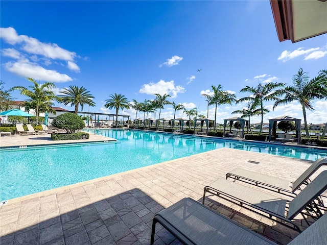 view of pool featuring a gazebo and a patio