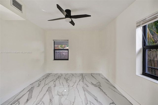 unfurnished room featuring ceiling fan