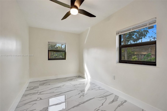 spare room featuring ceiling fan