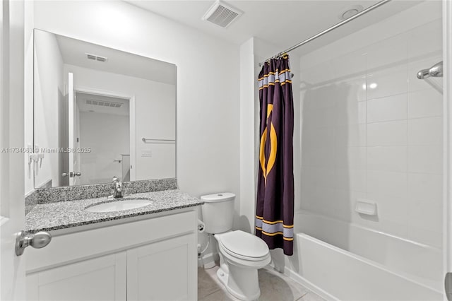 full bathroom with tile patterned floors, vanity, toilet, and shower / tub combo