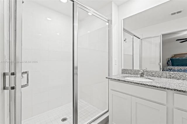 bathroom with vanity and walk in shower