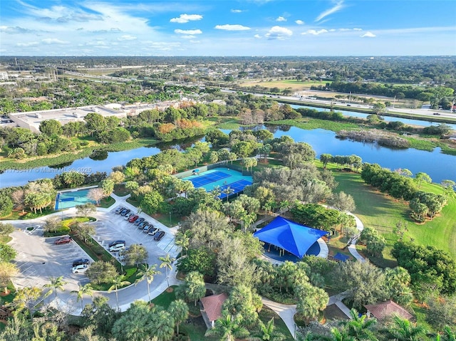 birds eye view of property with a water view