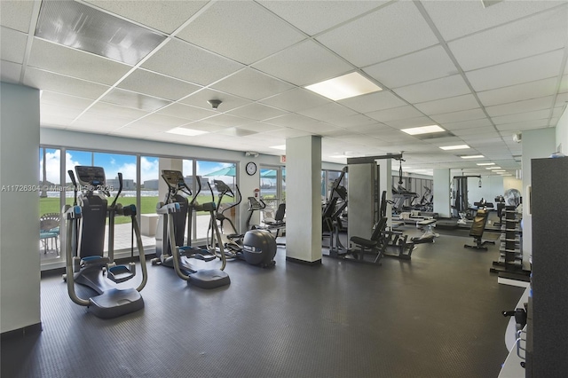 workout area featuring a drop ceiling