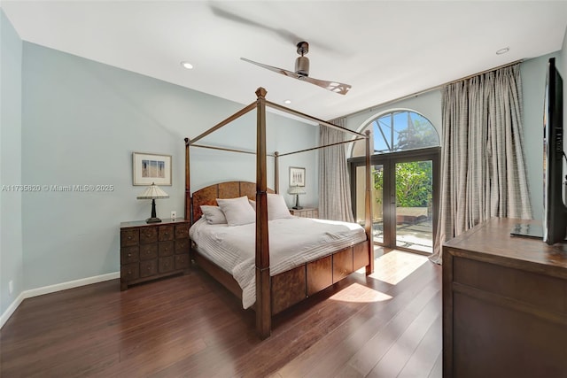 bedroom featuring dark wood-type flooring, access to outside, french doors, and ceiling fan