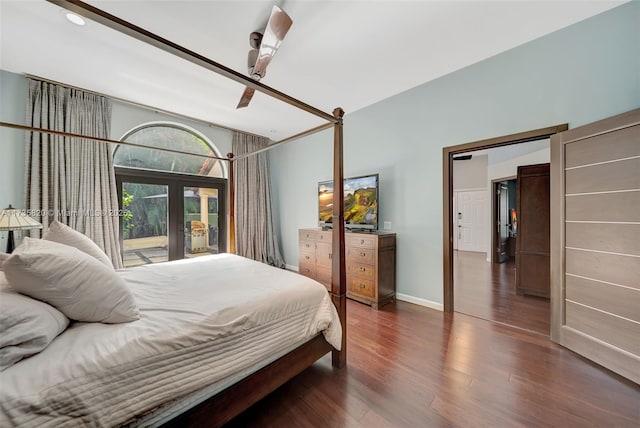 bedroom featuring french doors, ceiling fan, dark hardwood / wood-style floors, and access to outside