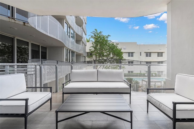 balcony featuring outdoor lounge area