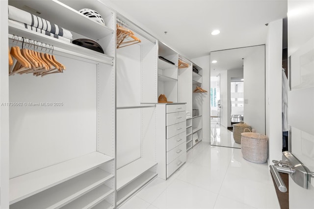 walk in closet featuring light tile patterned floors