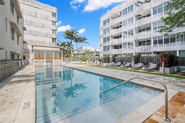 view of swimming pool with a patio area