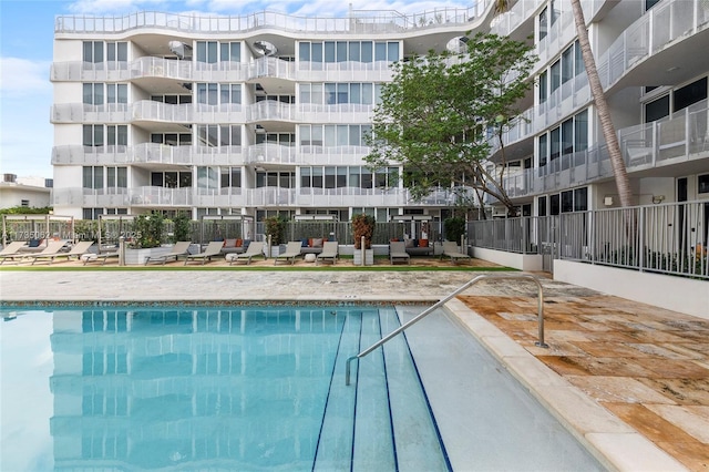 view of swimming pool featuring a patio