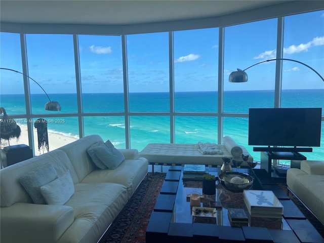 living room with floor to ceiling windows