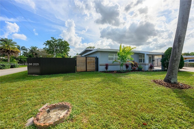 1498 NE 39th St, Oakland Park, FL 33334 - view of yard with a gate