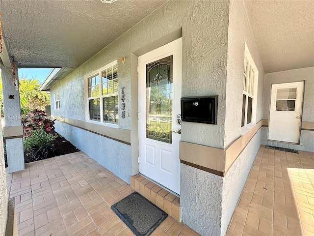 1498 NE 39th St, Oakland Park, FL 33334 - entrance to property featuring stucco siding