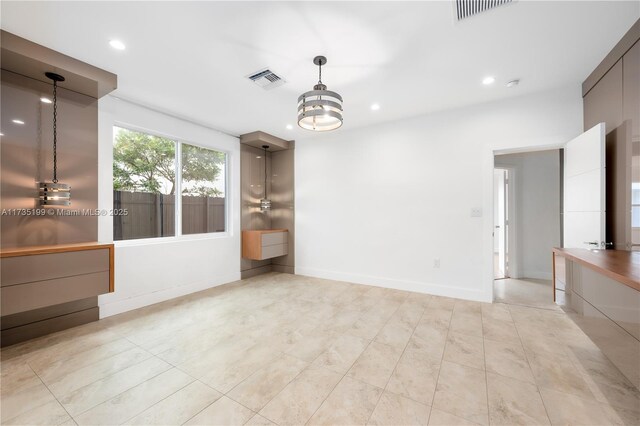1498 NE 39th St, Oakland Park, FL 33334 - unfurnished room with recessed lighting, light tile patterned floors, and baseboards