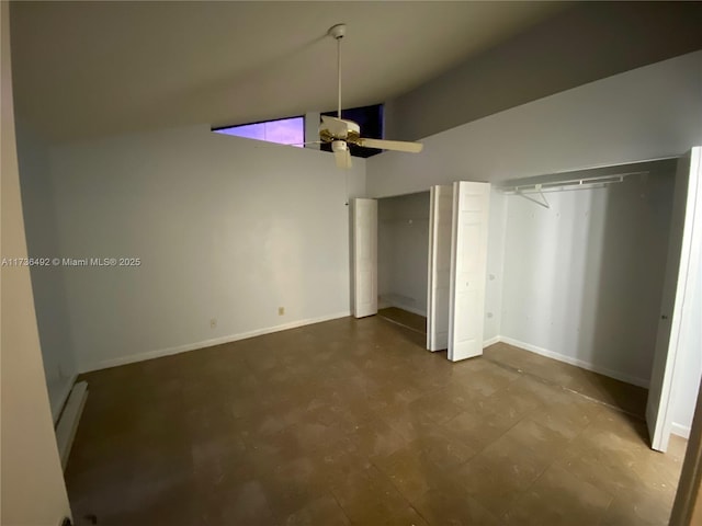 unfurnished bedroom featuring ceiling fan and high vaulted ceiling