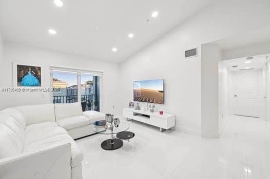 living room with vaulted ceiling