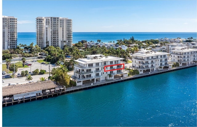 birds eye view of property featuring a water view