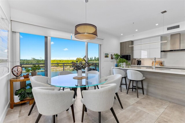 dining space featuring sink