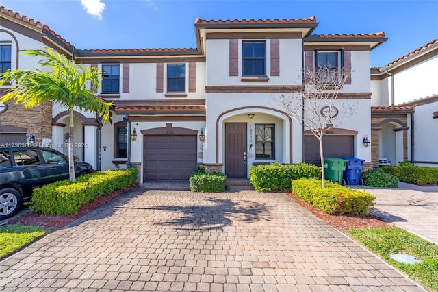 18330 NW 91st Ct Unit 18330, Hialeah, FL 33018 - multi unit property with stucco siding, decorative driveway, a tiled roof, and a garage