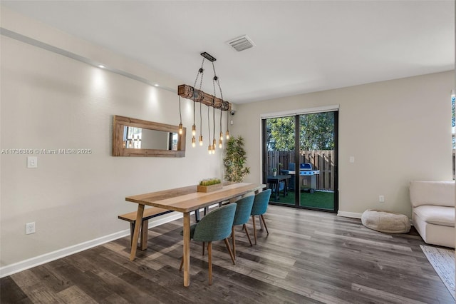 18330 NW 91st Ct Unit 18330, Hialeah, FL 33018 - dining room featuring dark wood finished floors and baseboards