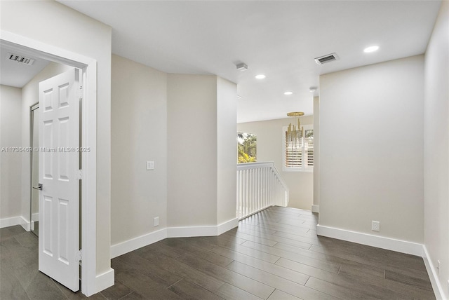 empty room featuring dark hardwood / wood-style floors