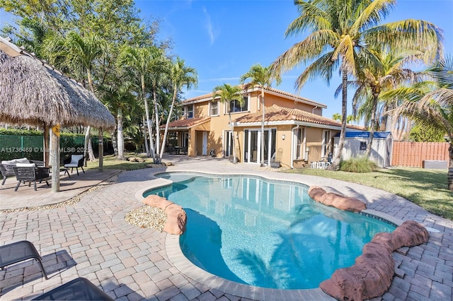 view of pool with a gazebo and a patio