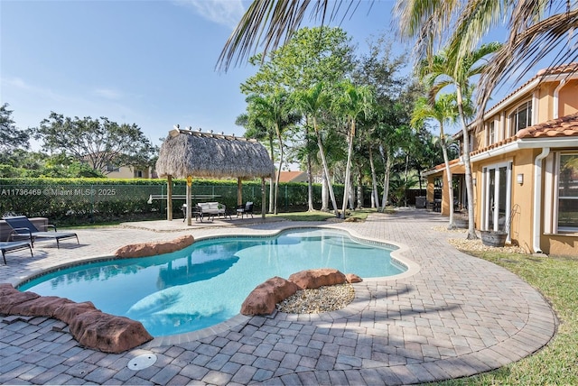 view of pool with a gazebo and a patio area