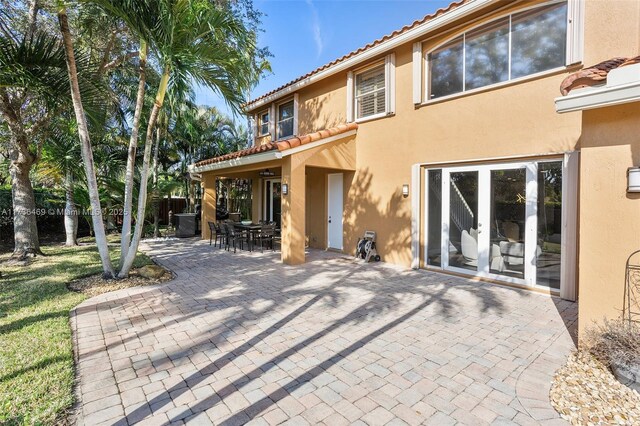 rear view of property with a patio