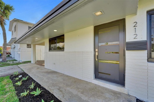 212 SW 11th Ave, Dania Beach, FL 33004 - entrance to property featuring stucco siding