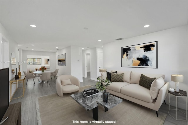 212 SW 11th Ave, Dania Beach, FL 33004 - living area featuring wood finished floors, recessed lighting, visible vents, and baseboards