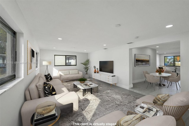 212 SW 11th Ave, Dania Beach, FL 33004 - living room featuring recessed lighting and baseboards