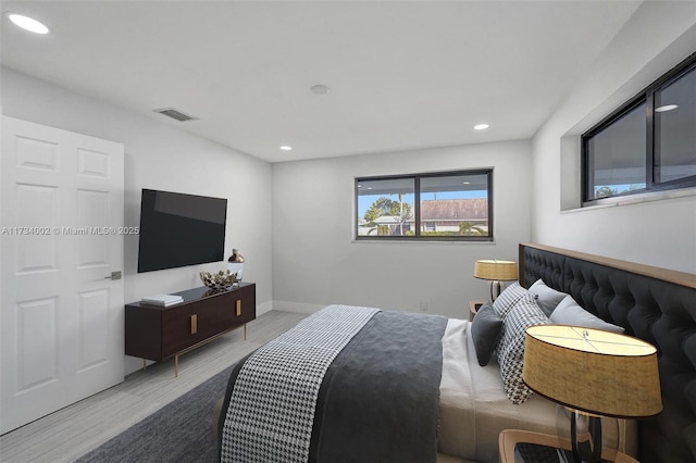 212 SW 11th Ave, Dania Beach, FL 33004 - bedroom featuring visible vents, recessed lighting, baseboards, and wood finished floors