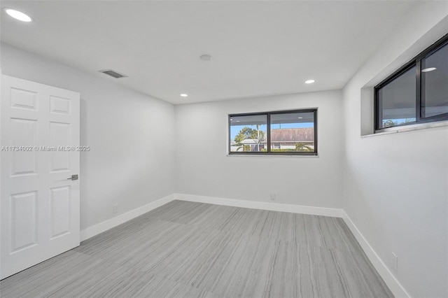 212 SW 11th Ave, Dania Beach, FL 33004 - empty room featuring recessed lighting, visible vents, and baseboards