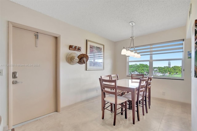 dining area with a textured ceiling