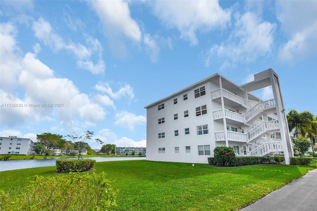 view of building exterior featuring a water view