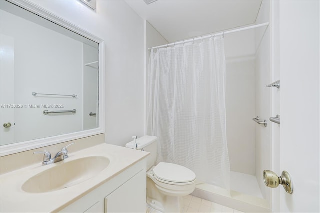 bathroom featuring vanity, toilet, and walk in shower