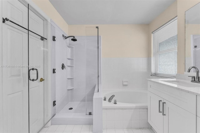 bathroom featuring vanity and plus walk in shower