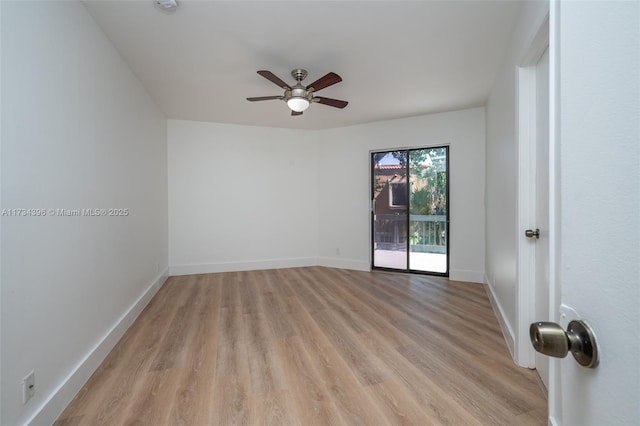 empty room featuring light hardwood / wood-style flooring and ceiling fan